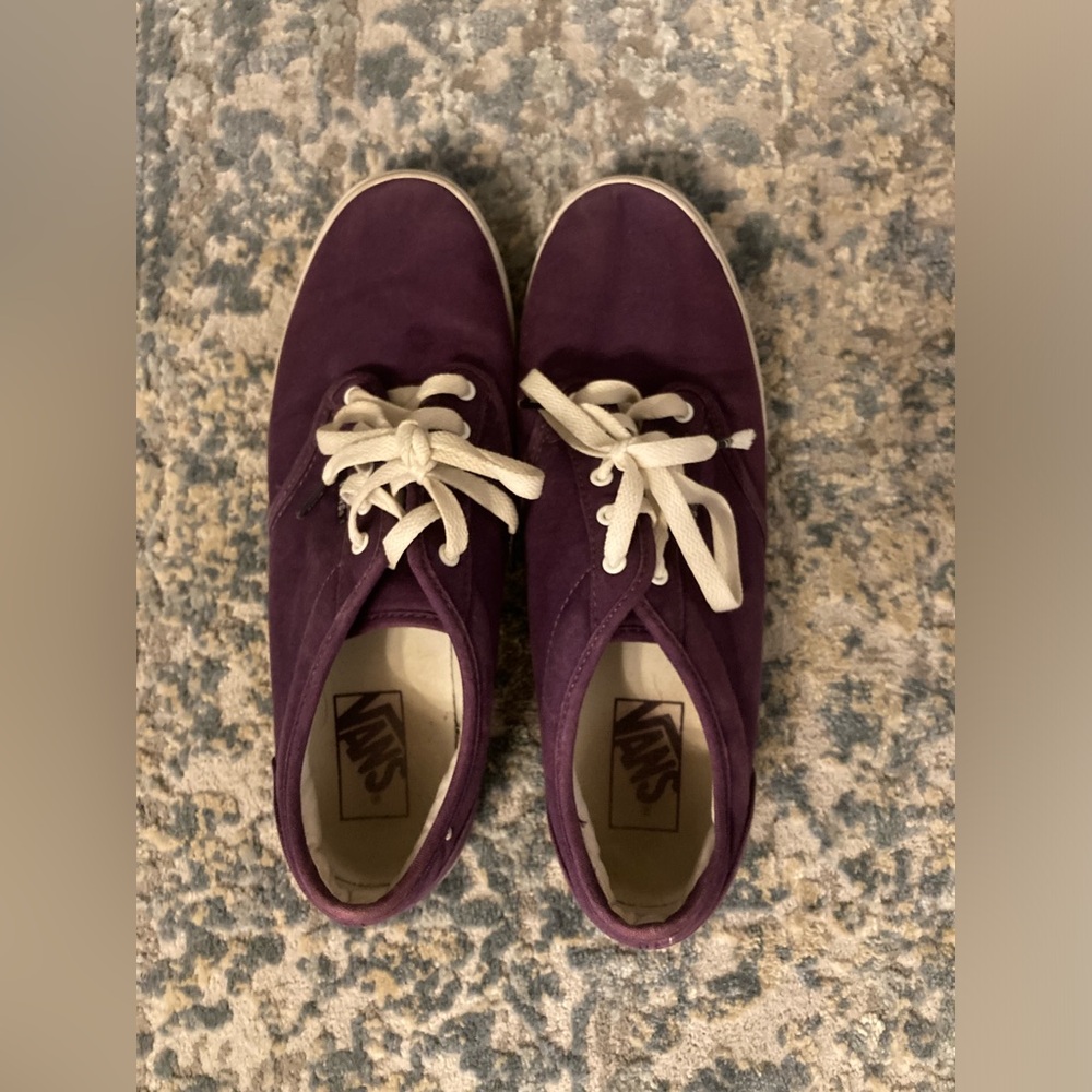 Dark Purple Vans. White laces. Women’s Size: 10.